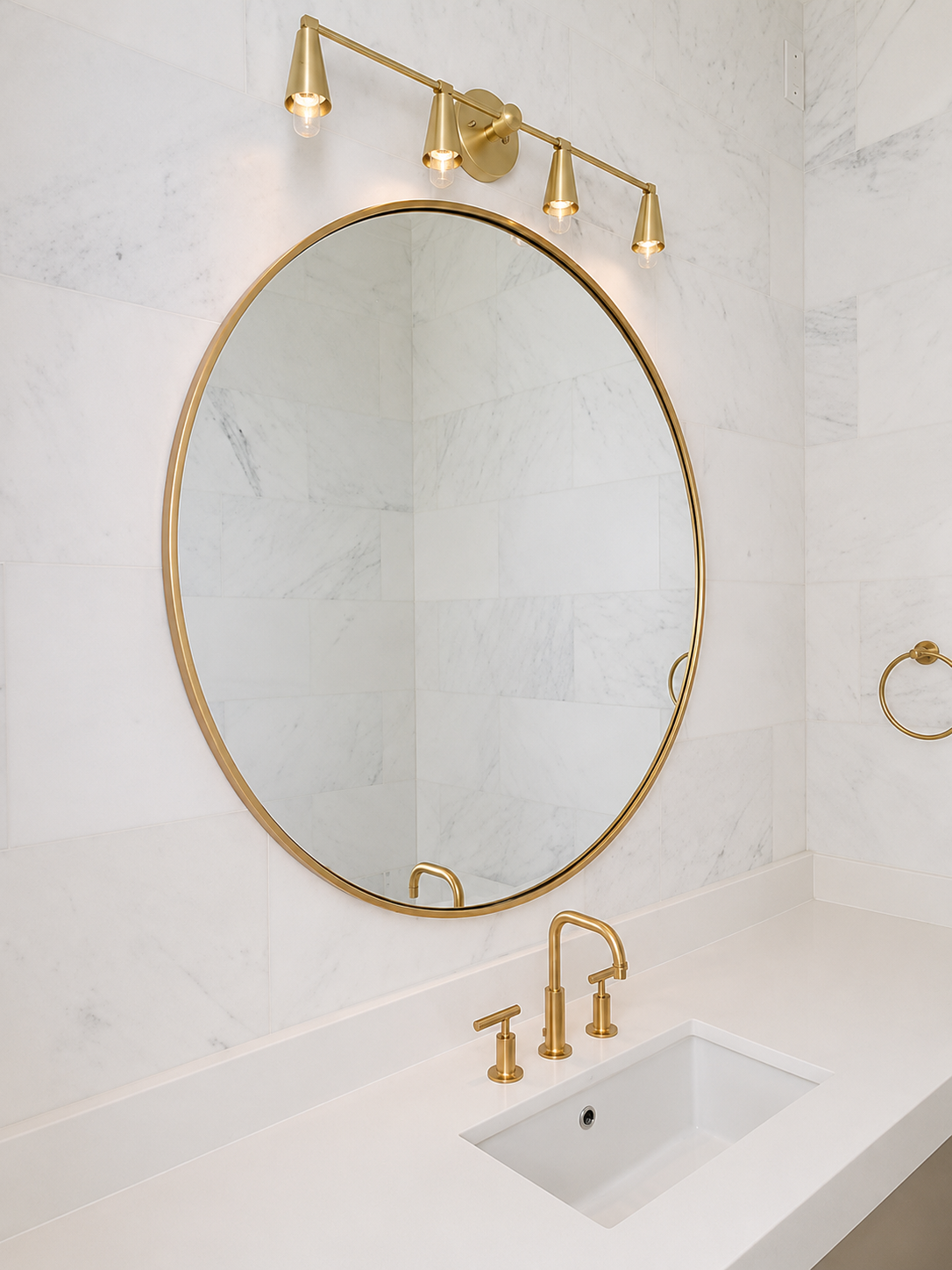 Bathroom mirror and vanity detail inside a custom home